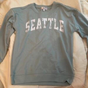 Chill Collective green Seattle sweater